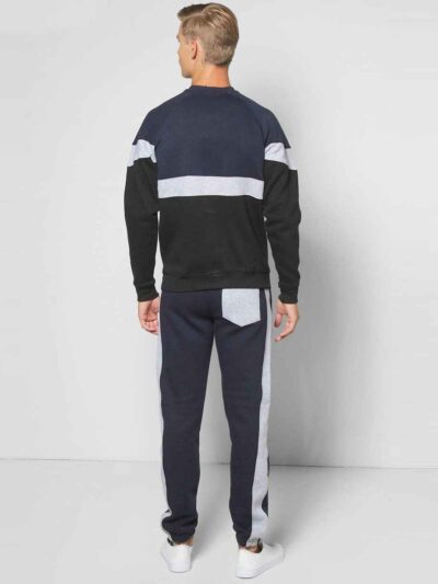 Panelled sweatshirt and tracksuit bottoms. Heavy-knit fleece texture. Detailed stitching, custom production example. Charcoal