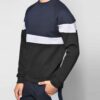 Panelled sweatshirt and tracksuit bottoms. Heavy-knit fleece texture. Detailed stitching, custom production example. Charcoal