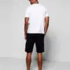 High GSM streetwear tracksuit: short-sleeve t-shirt and shorts. Thick fabric, visible stitching. Casual, comfortable fit. Hin