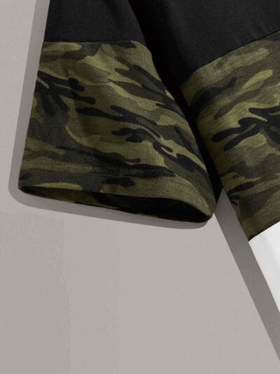 Men's crew neck tee featuring a color block camo pattern with bold letter graphics. Soft, breathable 100% cotton with clean s
