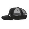 Close-up of a textured golf cap. Adjustable strap, detailed stitching, breathable sweatband. Pre-curved brim shades your eyes