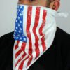 White bandana face mask printed with the American flag. Soft fabric, subtle stitching detail. Patriotic face covering. - View