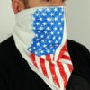 White bandana face mask printed with the American flag. Soft fabric, subtle stitching detail. Patriotic face covering. - View