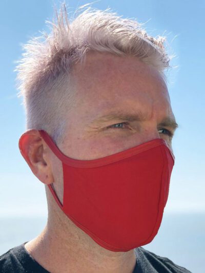 Vibrant assorted face masks. Soft, breathable fabric, meticulous stitching. Reusable cloth masks in blue, pink, and yellow hu
