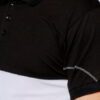 High-quality polo shirt, black and white contrast. Fine-knit texture, precise stitching detail visible. Custom-made casual we