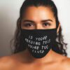 Close-up: Black fabric face mask with custom print. Soft, textured material, clean stitching. Daily use, unisex design. - Vie