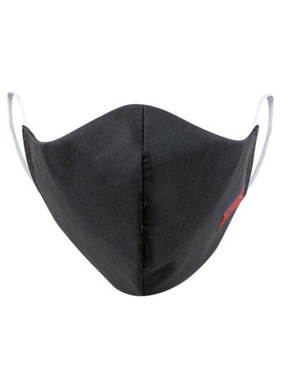 Close-up of a black face mask. Woven label detail. Finely stitched, durable fabric texture. Washable, reusable cloth face cov
