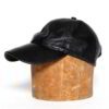 Black leather baseball cap: deep, rich texture, precision stitching. Stylish and durable sports headwear. Premium quality con