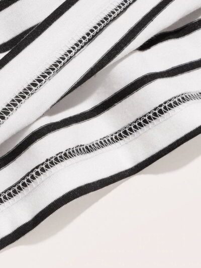 Boy's tee: bold stripes of blue, orange, and gray. Soft knit fabric, durable seams. Casual style for everyday wear, vibrant &