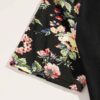 Close-up of a breathable polo shirt with vibrant custom dye-sublimation print. Note the fine stitching and textured, moisture