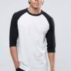 Pile of adult t-shirts, vibrant prints. Notice the smooth cotton blend, clean seams. Short sleeve, crew neck tees in assorted