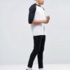 Pile of adult t-shirts, vibrant prints. Notice the smooth cotton blend, clean seams. Short sleeve, crew neck tees in assorted