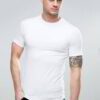 Close-up of folded, blank t-shirts. Smooth, fine knit fabric, even stitching. Premium feel. Ideal for printing. Vibrant color