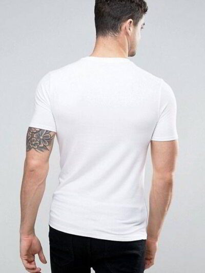 Close-up of folded, blank t-shirts. Smooth, fine knit fabric, even stitching. Premium feel. Ideal for printing. Vibrant color