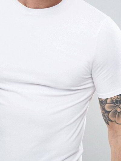 Close-up of folded, blank t-shirts. Smooth, fine knit fabric, even stitching. Premium feel. Ideal for printing. Vibrant color