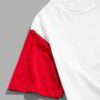 Close-up of folded bulk t-shirts. Soft cotton texture, visible stitching. Basic tees ready for printing or branding. Heather