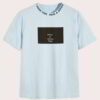 Stacked blank t-shirts, heather gray & white, soft knit texture visible. Crew neck, clean seams, ready for printing. - View 1