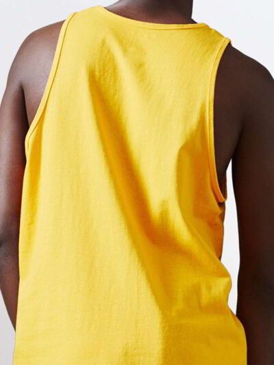 Close-up of blank cotton singlets, showcasing soft knit texture & clean stitching. Perfect for printing, hinting at various c
