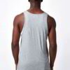 Close-up of bulk cotton tank tops showing soft, breathable knit fabric. Fine stitching detail, ideal for layering or summer w