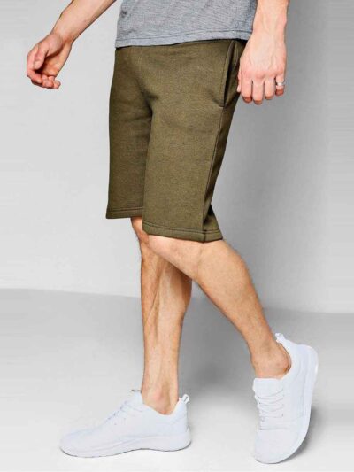 Lightweight summer shorts with clean stitching. Close-up showing soft fabric texture and potential for custom logo placement.