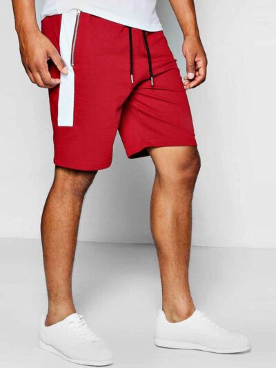 Close-up of black workout shorts; tailored fit, clean stitching, breathable performance fabric. Perfect for customized corpor