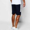 Close-up of black workout shorts; tailored fit, clean stitching, breathable performance fabric. Perfect for customized corpor