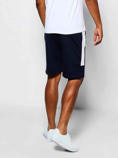 Close-up of black workout shorts; tailored fit, clean stitching, breathable performance fabric. Perfect for customized corpor