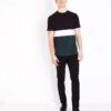 Pile of t-shirts, custom-printed with slogans. Soft cotton knit, clean seams, vibrant ink colors. Customizable garment in bul
