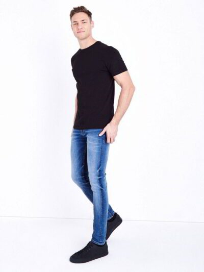 Stacked bulk t-shirts. Soft, heathered texture, double-stitched seams visible. Ideal for custom streetwear designs. Neutral t