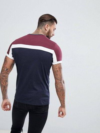 Soft, bulk cotton t-shirts. Notice the fine stitching & smooth texture. Classic crew neck style, available in neutral tones.