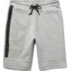 Close-up of black athletic gym shorts showing high-stretch fabric, durable stitching, and breathable texture. Designed for pe