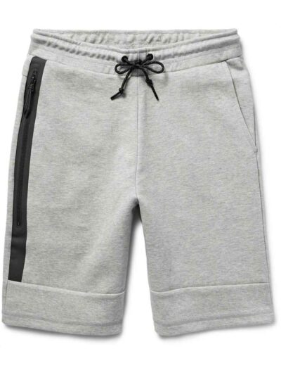 Close-up of black athletic gym shorts showing high-stretch fabric, durable stitching, and breathable texture. Designed for pe
