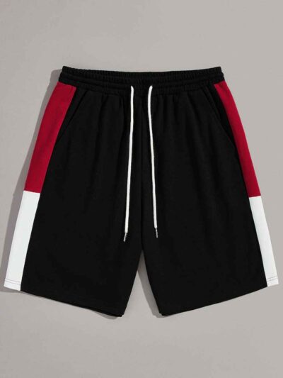 Close-up of athletic training shorts. Performance fabric with subtle texture, reinforced stitching. Breathable, moisture-wick