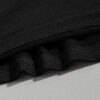 Close-up of athletic training shorts. Performance fabric with subtle texture, reinforced stitching. Breathable, moisture-wick