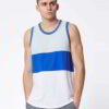 Close-up of bulk moisture wicking tank tops. Soft, breathable fabric with reinforced stitching. Ideal for workout wear, vibra