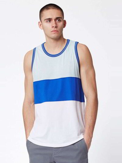 Close-up of bulk moisture wicking tank tops. Soft, breathable fabric with reinforced stitching. Ideal for workout wear, vibra