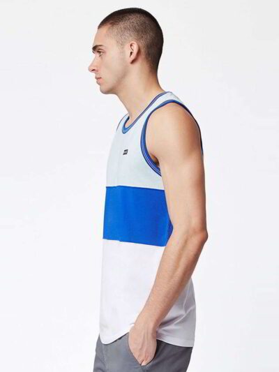 Close-up of bulk moisture wicking tank tops. Soft, breathable fabric with reinforced stitching. Ideal for workout wear, vibra