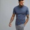 Stack of blank t-shirts ready for printing, soft cotton texture, clean seams. Perfect for custom designs & bulk orders. - Vie