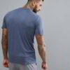 Stack of blank t-shirts ready for printing, soft cotton texture, clean seams. Perfect for custom designs & bulk orders. - Vie