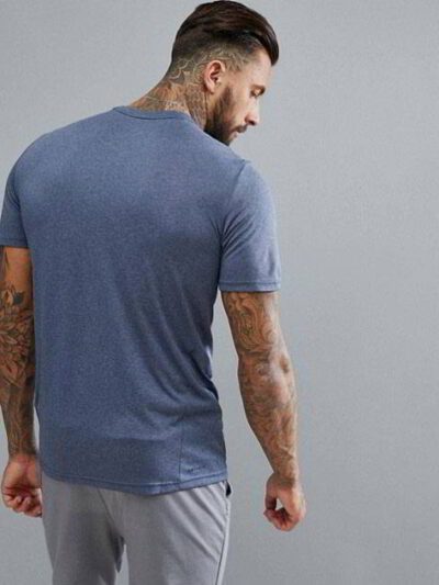 Stack of blank t-shirts ready for printing, soft cotton texture, clean seams. Perfect for custom designs & bulk orders. - Vie