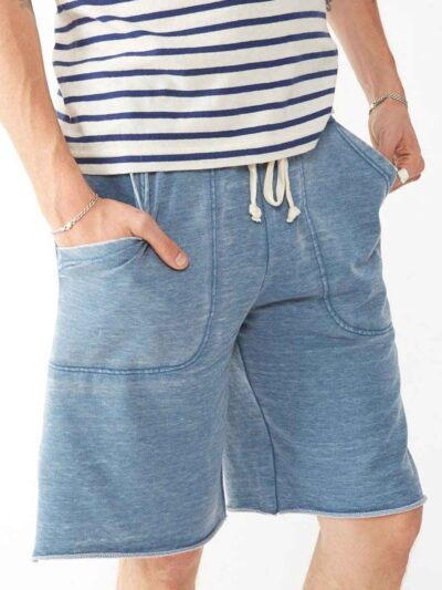 Close-up of bulk workout shorts. Soft, heathered gray fabric, durable reinforced stitching. Elastic waistband, athletic fit,