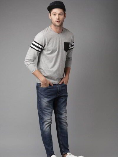 Pile of vibrant college t-shirts: soft cotton feel, durable stitching. Mix of classic crewneck & modern v-neck styles. Great
