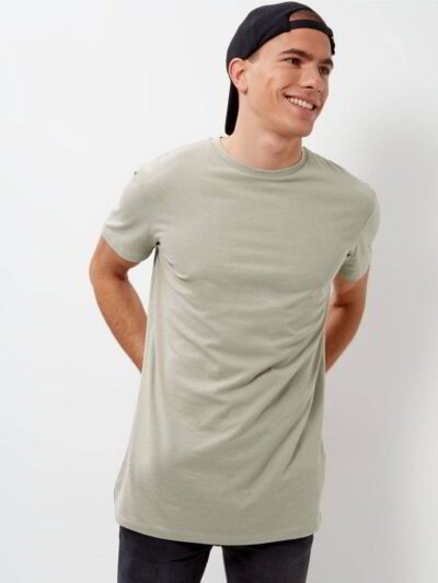 Close-up of custom team shirts. Soft, heathered gray fabric, crisp screen-printed logo, durable double-needle stitching on cr