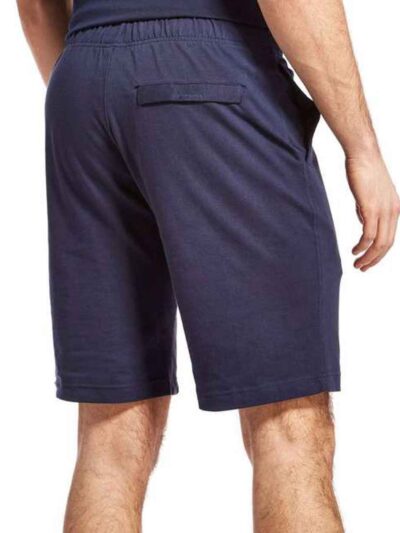 Lightweight swim trunks in vibrant blue, quick-drying fabric texture. Note the reinforced stitching and comfortable elastic w