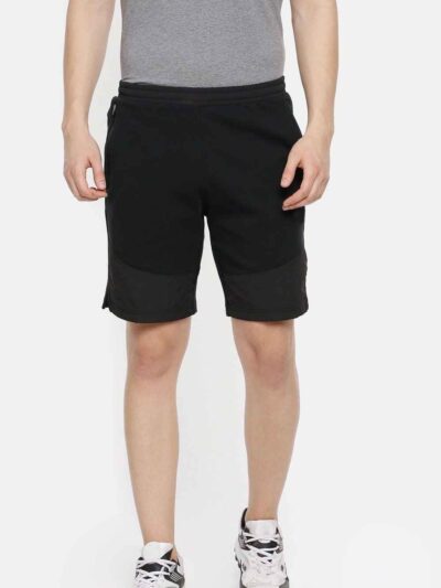 Lightweight summer shorts in bulk. Casual street style, hints of olive green, noticeable durable stitching. Perfect for warm
