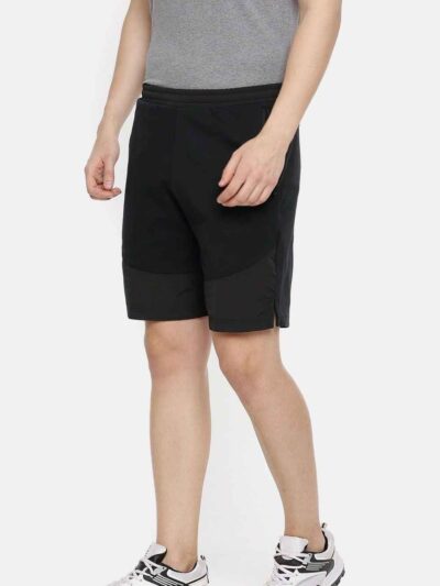 Lightweight summer shorts in bulk. Casual street style, hints of olive green, noticeable durable stitching. Perfect for warm