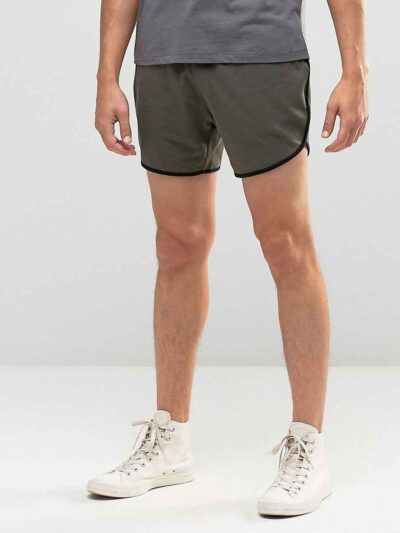 Lightweight beach shorts with vibrant, all-over sublimation print. Notice the fine stitching and soft, breathable fabric text