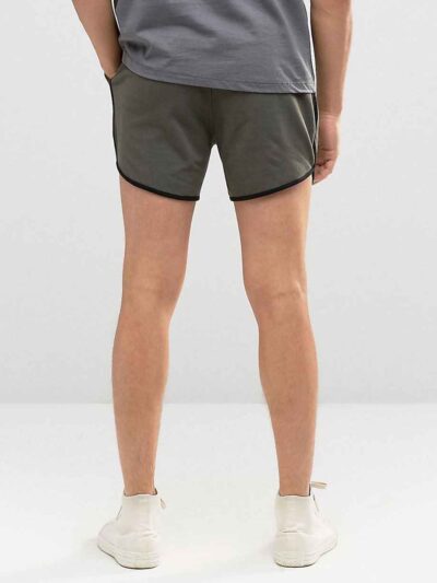 Lightweight beach shorts with vibrant, all-over sublimation print. Notice the fine stitching and soft, breathable fabric text