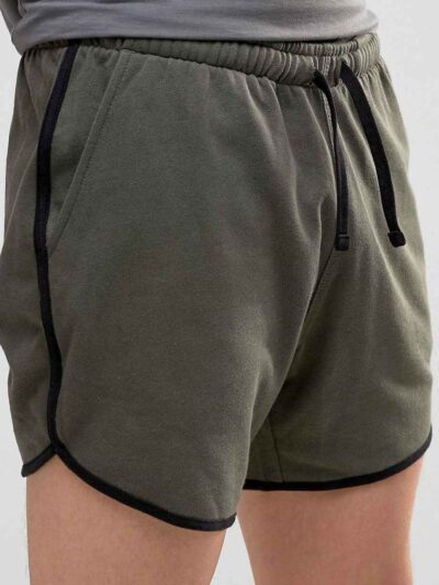 Lightweight beach shorts with vibrant, all-over sublimation print. Notice the fine stitching and soft, breathable fabric text