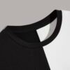 Close-up of bulk t-shirts. Soft cotton texture, neat stitching. Round neck, vibrant colors hints, ready for print. - View 2 o